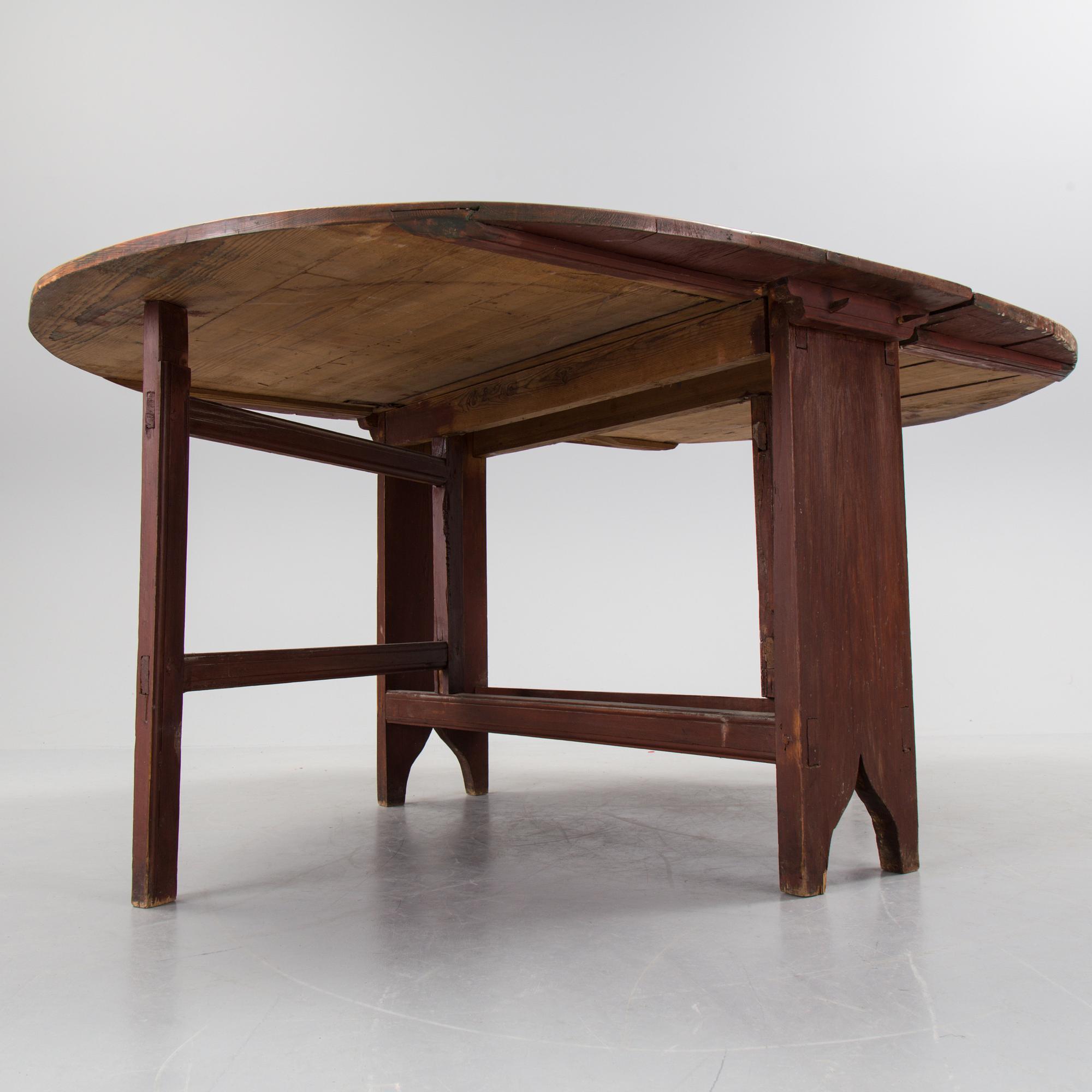 A 19th century painted flap table.