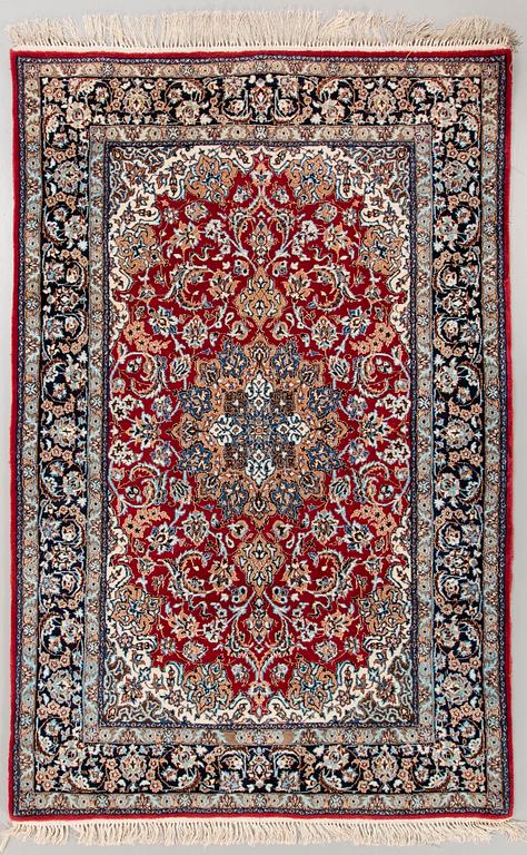 An old part silk Isfahan carpet ca 177x114 cm.