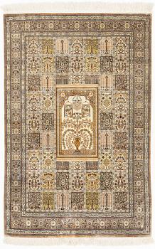 A carpet, oriental silk, circa 145 x 97 cm.
