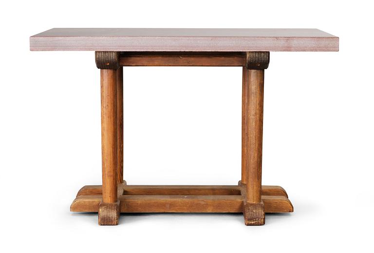 An Axel-Einar Hjorth stained birch 'Sandhamn' table with a later red limestone top, Nordiska Kompaniet ca 1929.