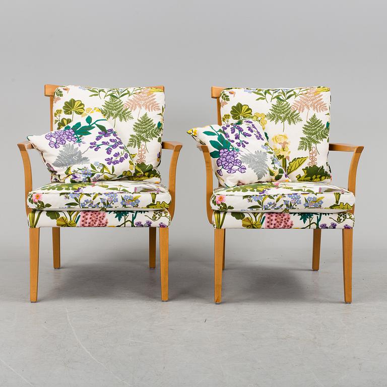 A pair of Norell easy chairs, 20th century.