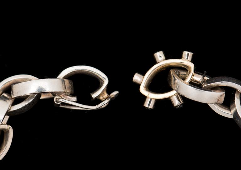 HALSKEDJA, 18 k guld samt vitguld med små briljantslipade diamanter ca 0.06 ct. Vikt ca 61 gram.