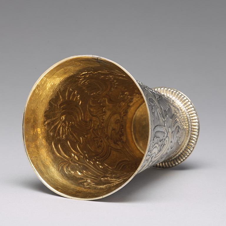 A Russian 18th century parcel-gilt silver beaker and cover, mark of Grigorij Poltow, Moscow (1755-1768).