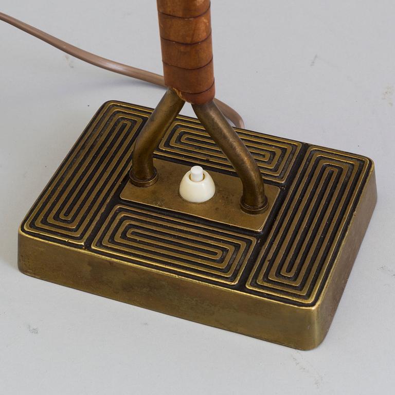 A 1940s Sonja Katzin brass table light from Asea.