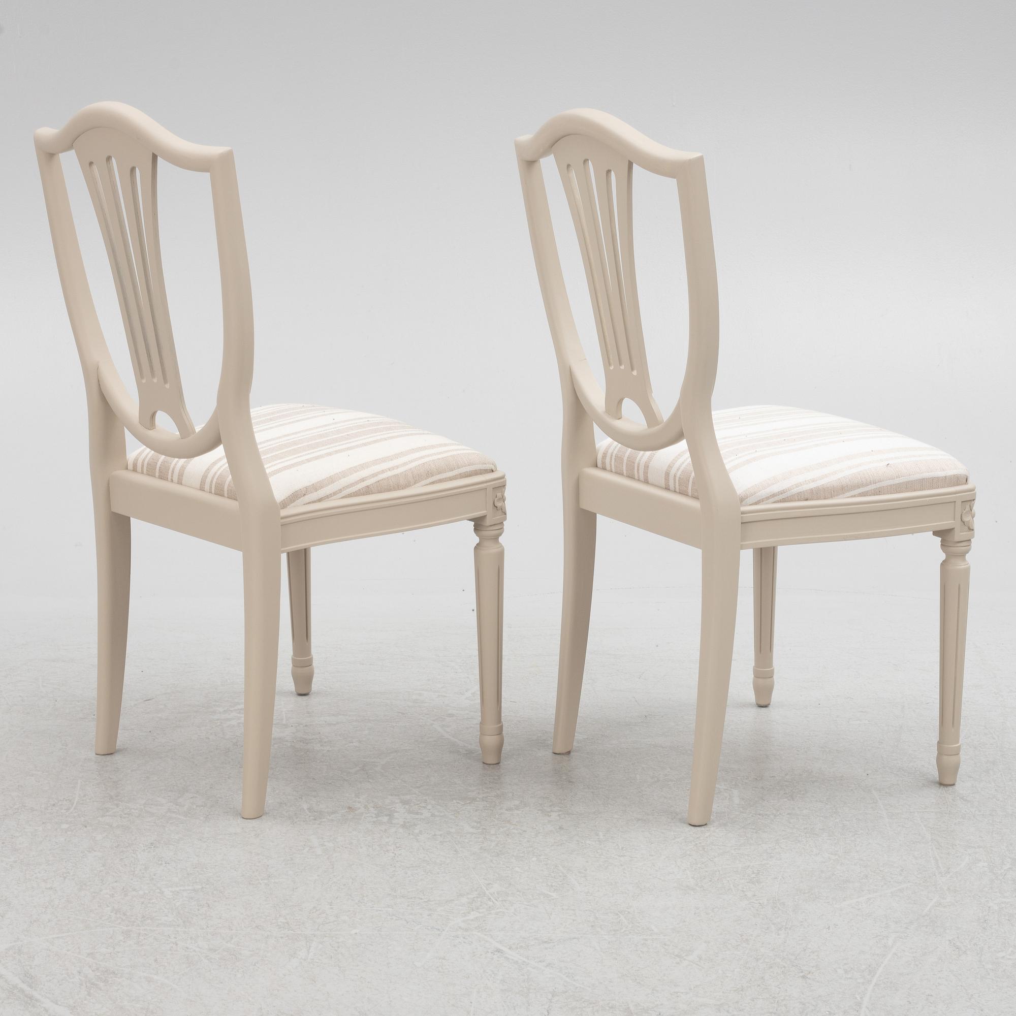 A Gustavian Style Dining Table and 10 Chairs, second half of the 20th Century.