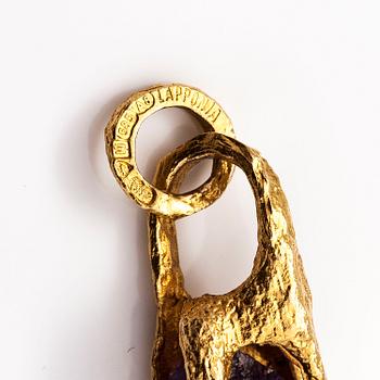 BJÖRN WECKSTRÖM, A 14K gold pendant "Reindeer clock" with an amethyst and chain "Raito". Lapponia 1978  and 1982.