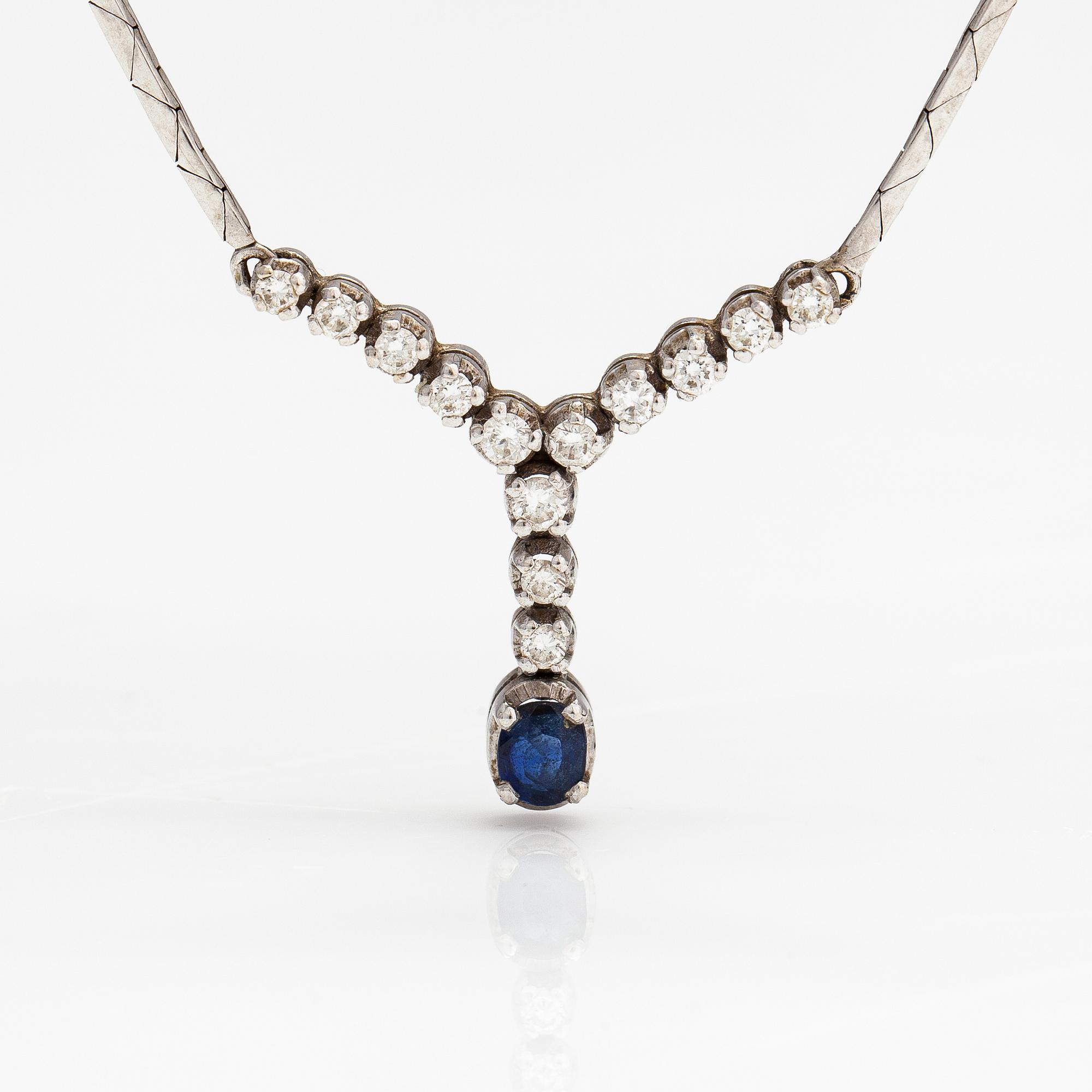 An 18K white gold necklace with a sapphire and diamonds ca. 0.41 ct in total. Finnish import marks.