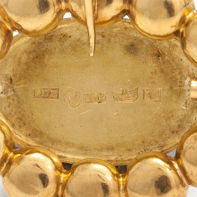 An 18K gold brooch/pendant. Johan Edvard Fagerroos, Helsinki 1862.