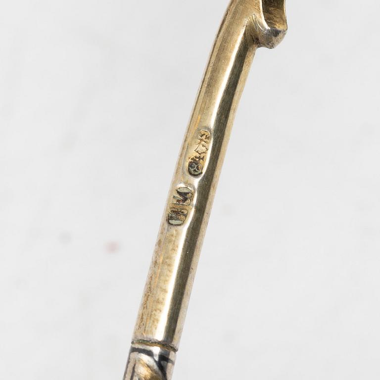 A Russian silver niello napkin ring and spoon, late 19th century-early 20th century.