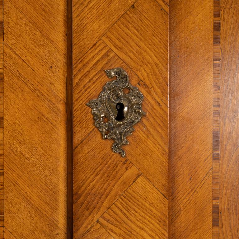 A Swedish rococo cabinet, mid 18th Century.