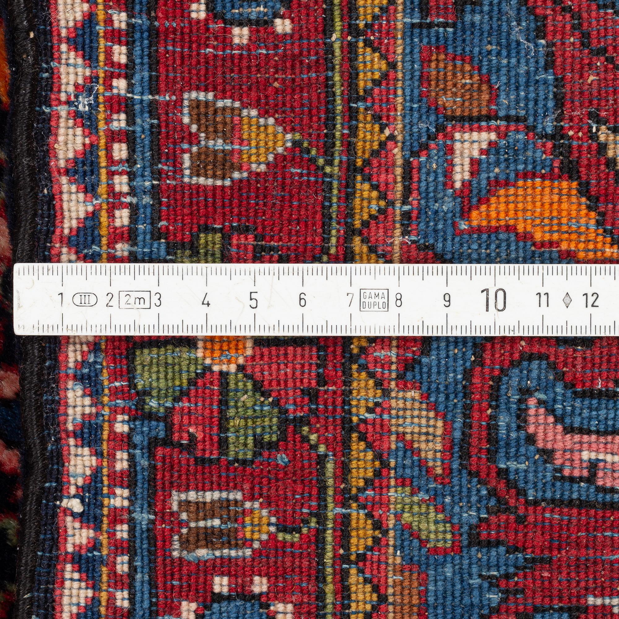 A Sarouk/Jozan rug, c. 86 x 64 cm.