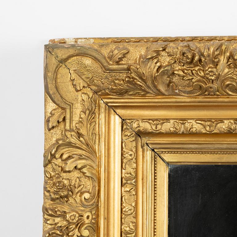 A picture frame, early 20th century, converted into a mirror.