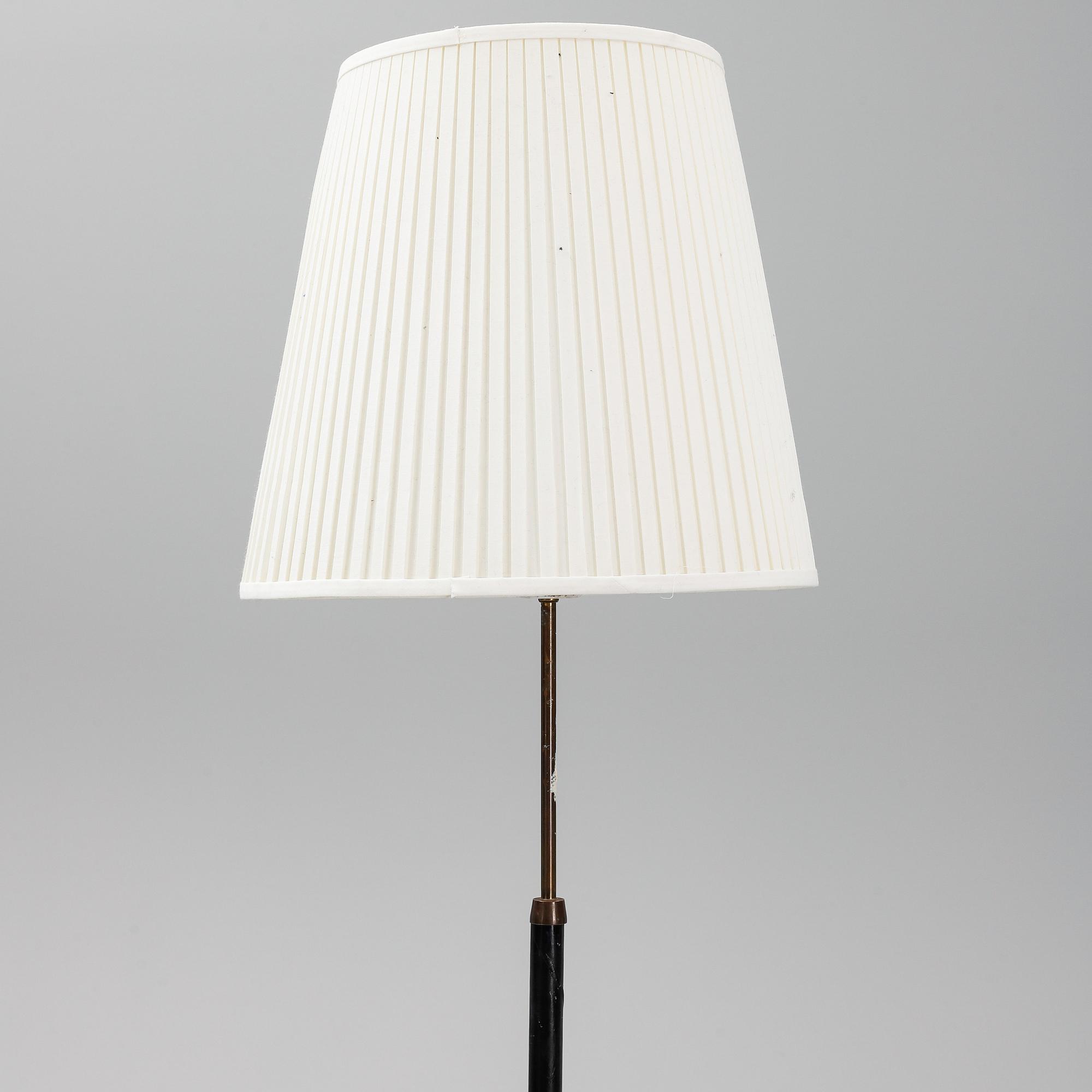 A '7071' floor lamp by Falkenbergs belysning.