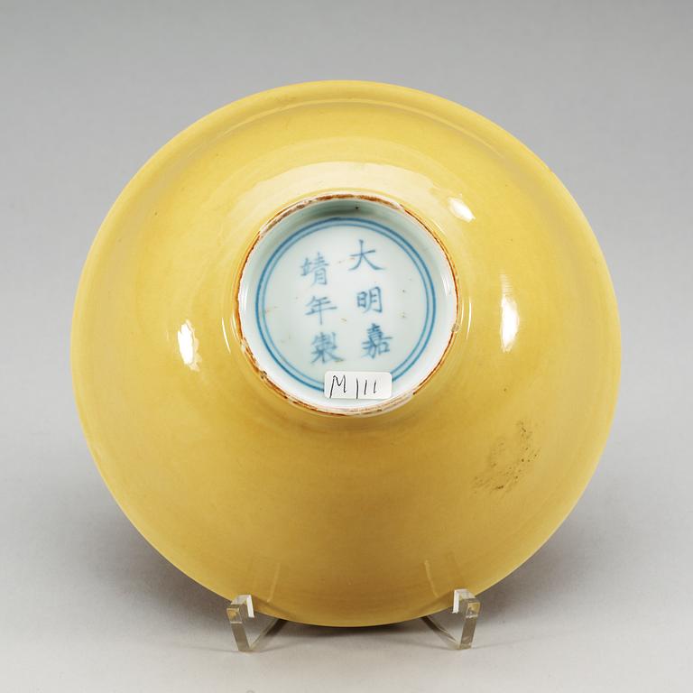 A yellow glazed bowl, Ming dynasty with Jiajings six character mark and of the period (1522-66).