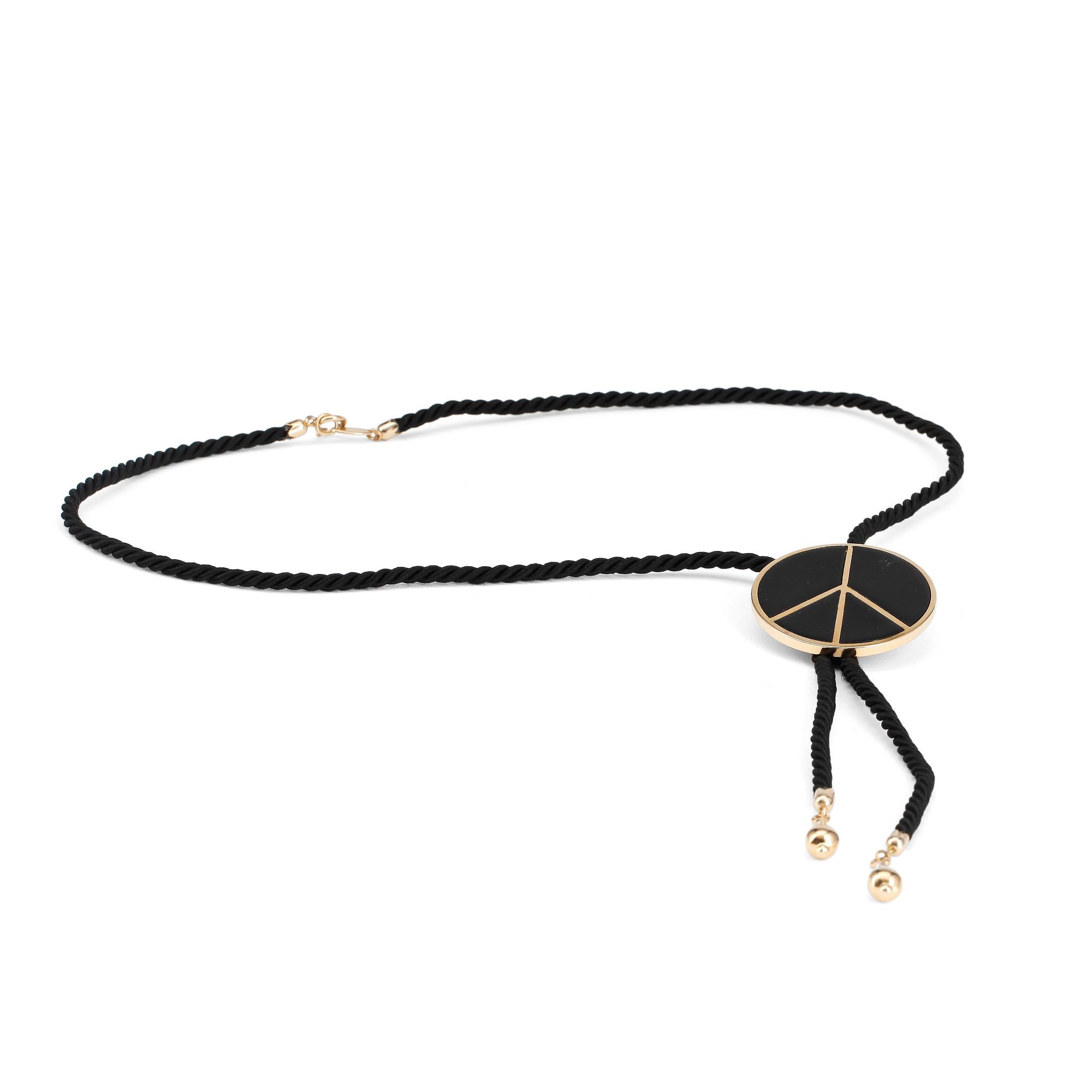 MOSCHINO, a peace-sign necklace.