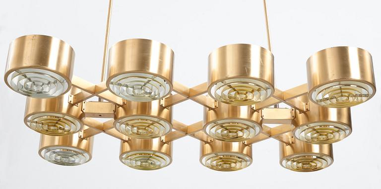 Hans-Agne Jakobsson, A Hans Agne Jakobsson twelve light brass chandelier, model T 363/12, Markaryd, Sweden 1960-70's.