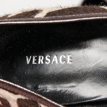 SKOR, Versace.