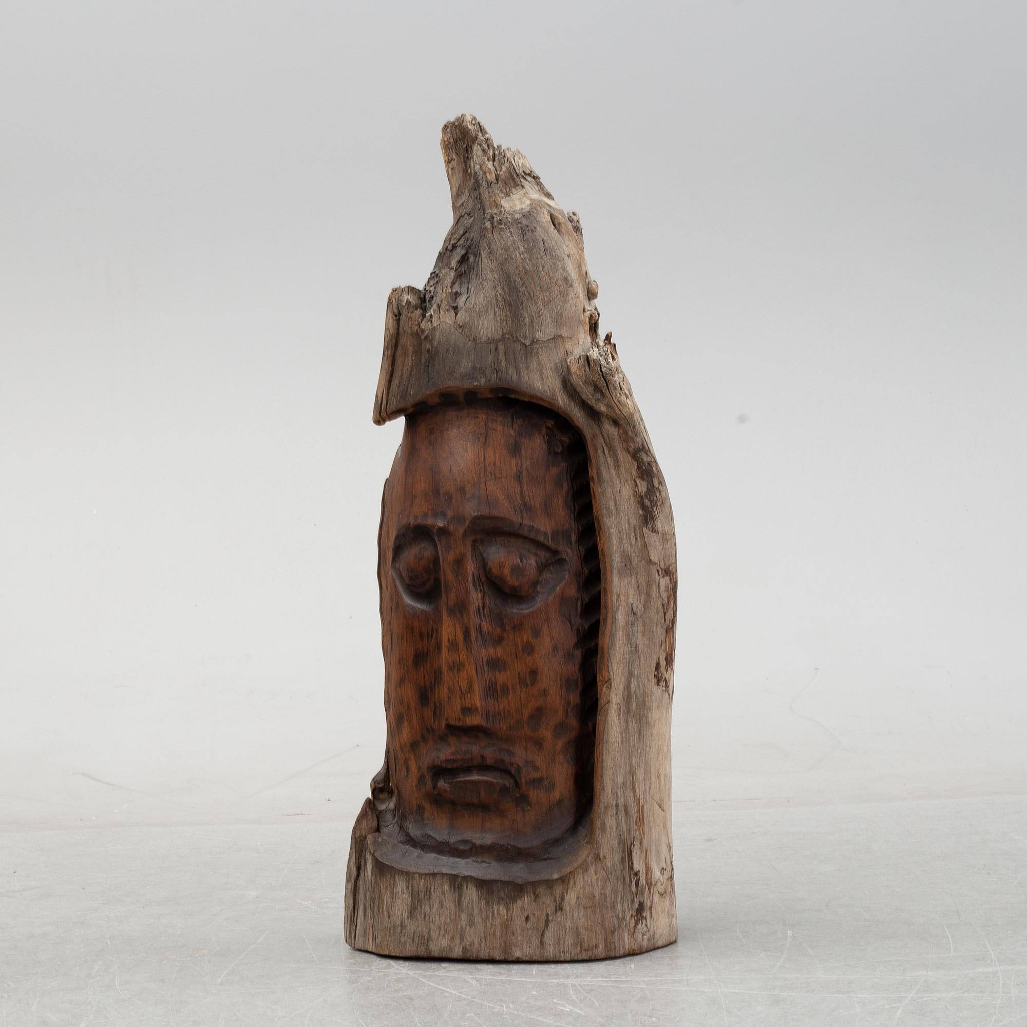 Alois Lindner, a wooden sculpture, signed and dated -55.