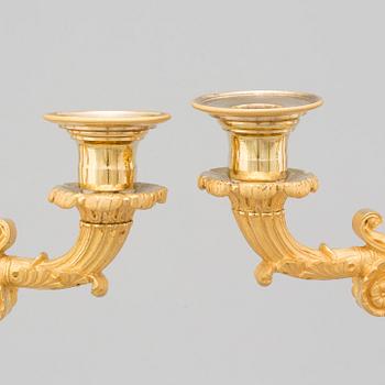 A PAIR OF LATE EMPIRE ORMOLU CANDELABRA, first half of the 19th century.