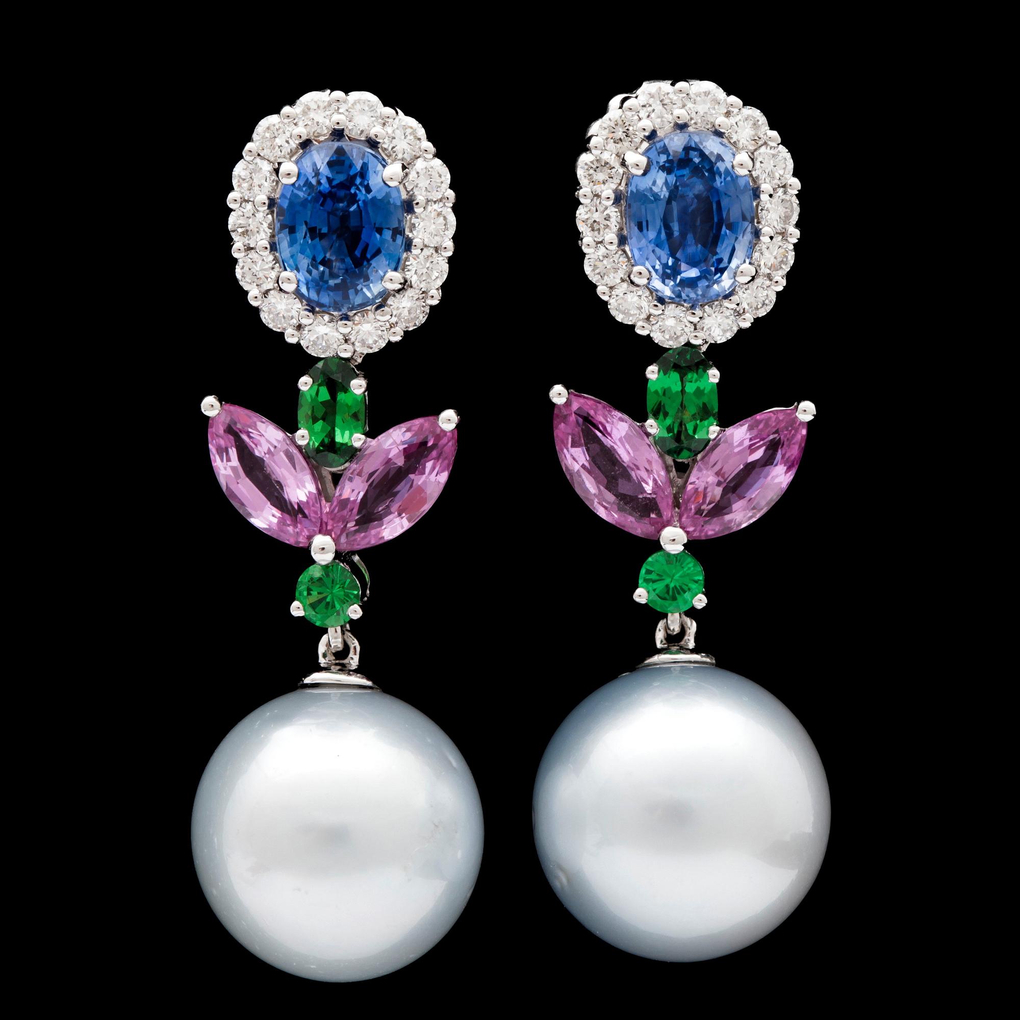A pair of sapphire, tsavorite and cultured South sea pearl earrings.