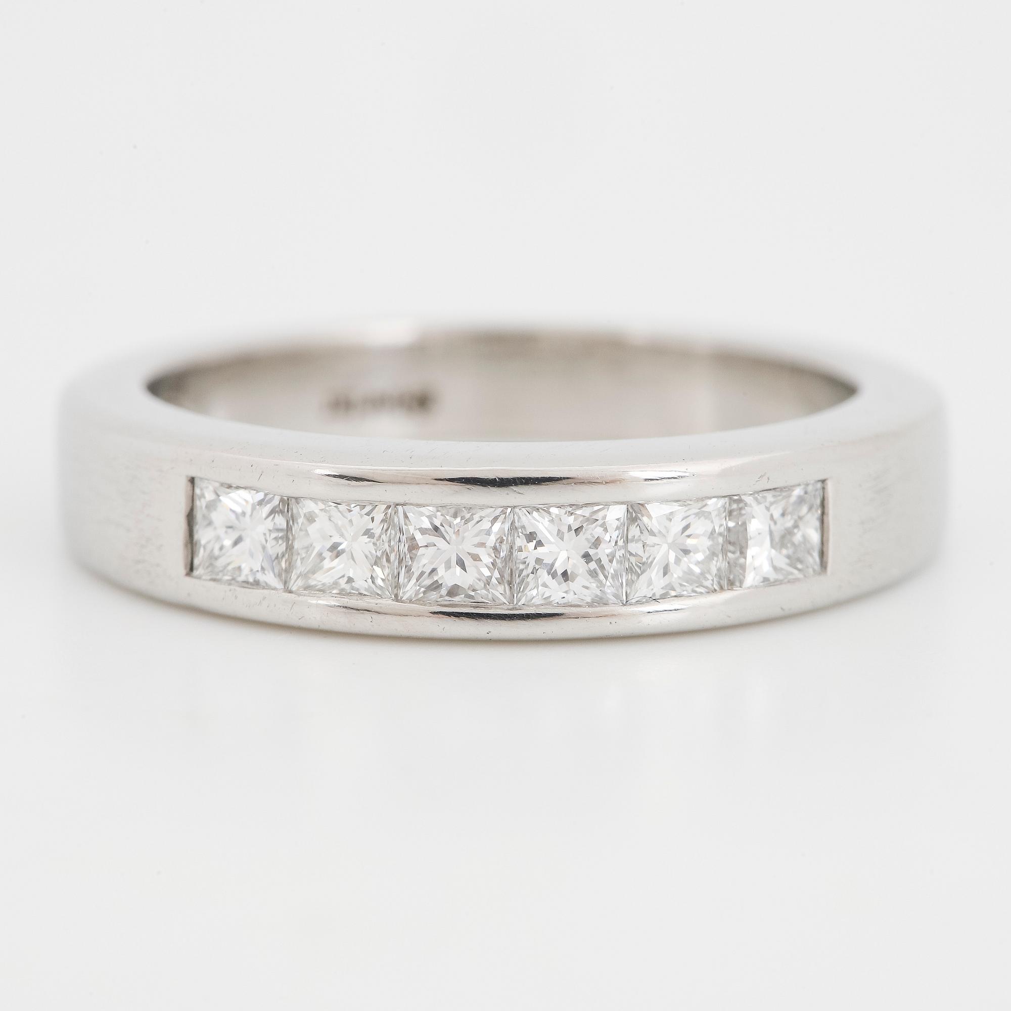 Platinum and six princess-cut diamond ring.