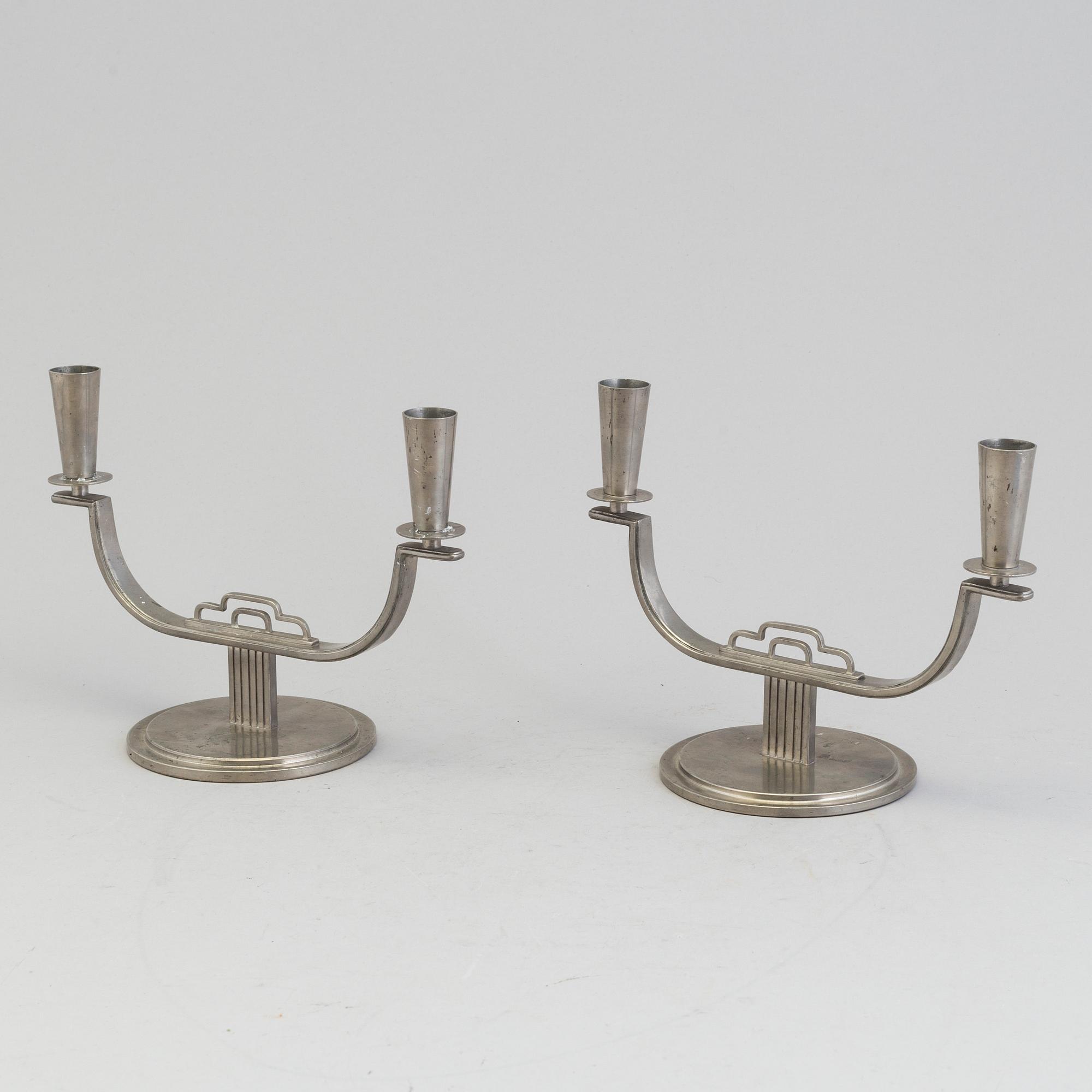 A pair of pewter candelabra by Carl Einar Borgström, Ystad Metall, marked CEB.