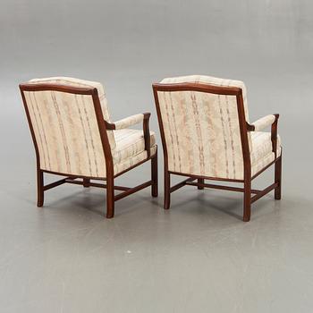 A pair of Ellinor armchairs from Bröderna Andersson later part of the 20th century.