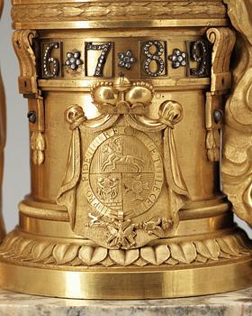 A Louis XVI 18th Century mantel clock with the family Golitsyn's arms and the Polish Order of the White Eagle.