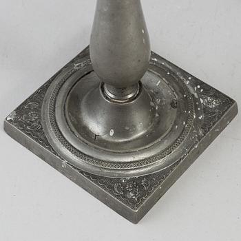 A pair of empire pewter candlesticks, first half of the 19th century.