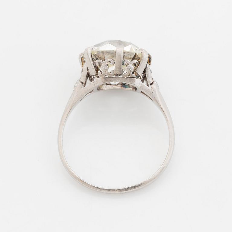 A platinum ring set with an old-cut diamond.