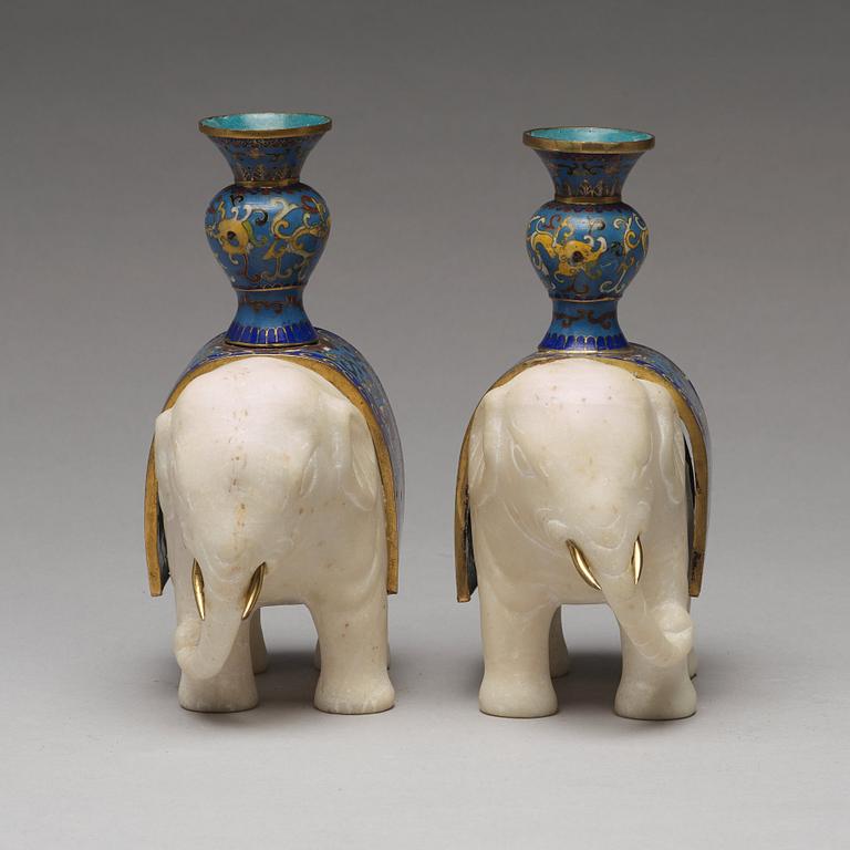 A pair of cloisonné and marble elephant candle holders, late Qing dynasty, about 1900.