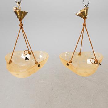 A pair of 1940s ceiling pendants.