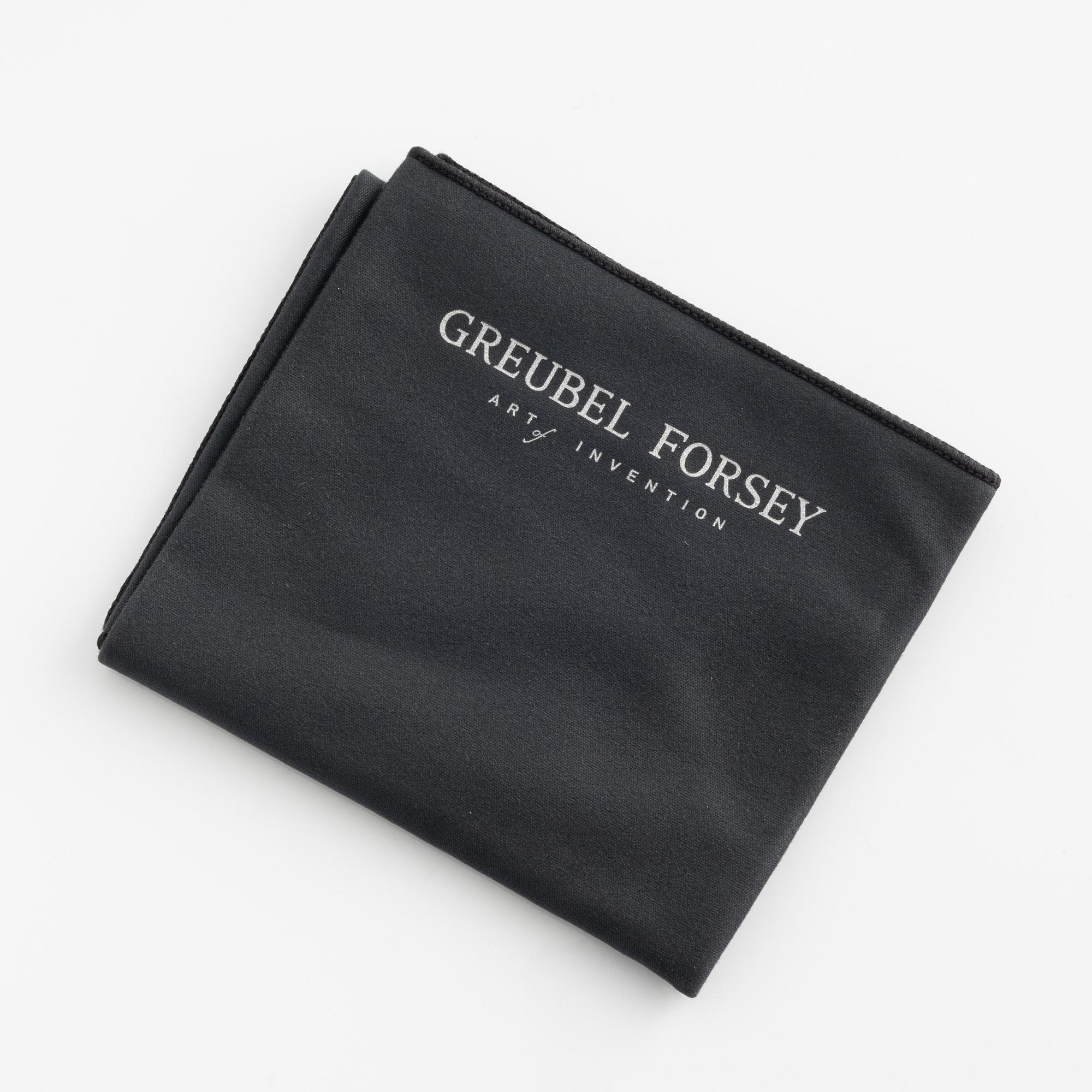 Greubel Forsey, display gloves and polishing cloth.