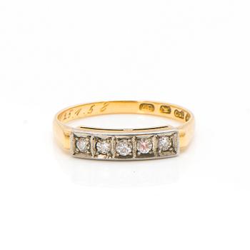 An 18K gold ring with diamonds ca. 0.22 ct in total. Päiviö Veikko, Turku 1955.