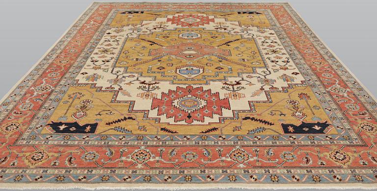 A carpet, Heriz design, approx. 351 x 269 cm.