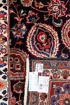 A Meshed carpet, c. 352 x 255 cm.