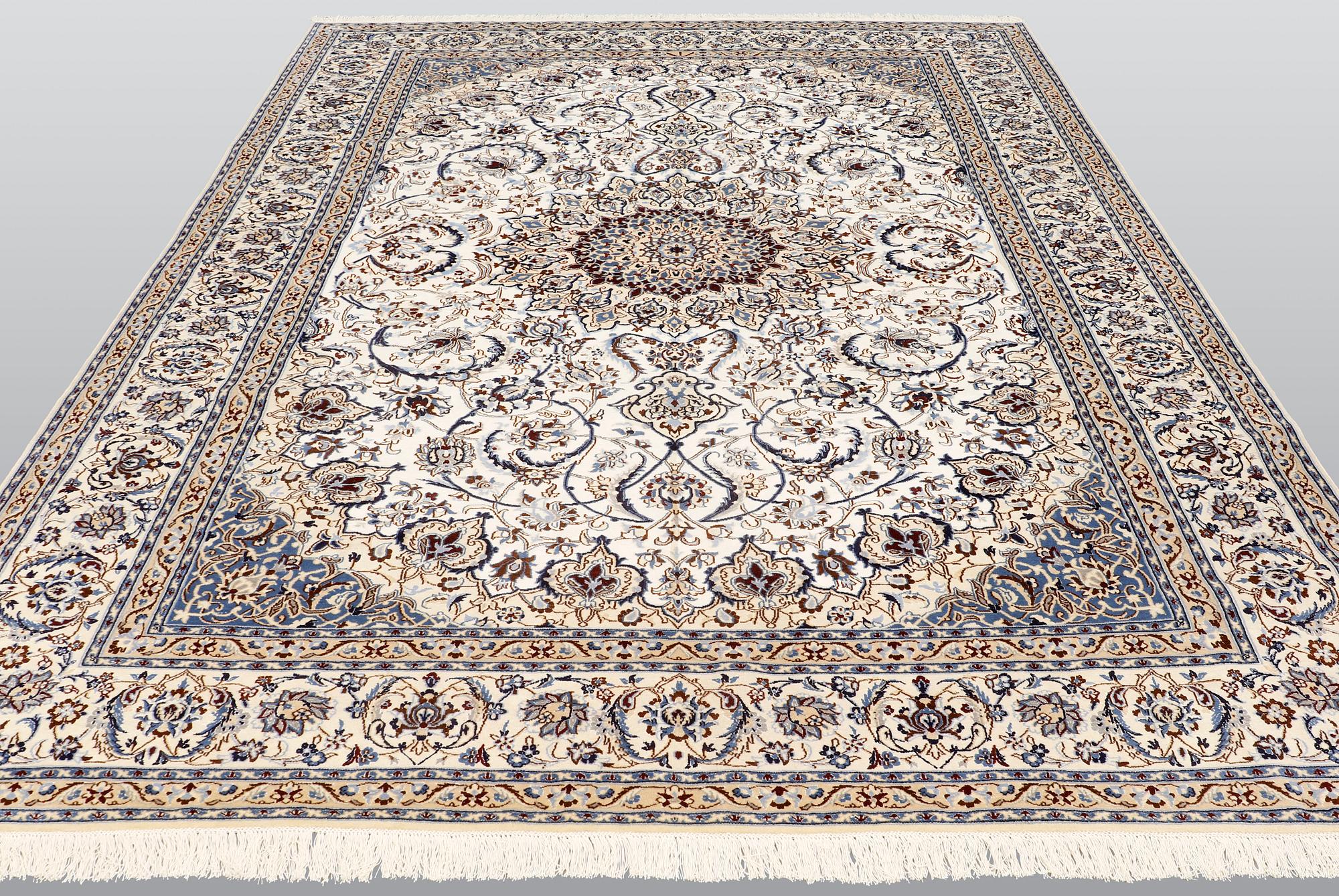 A carpet, Nain part silk so called 9LAA, ca 375 x 244 cm.