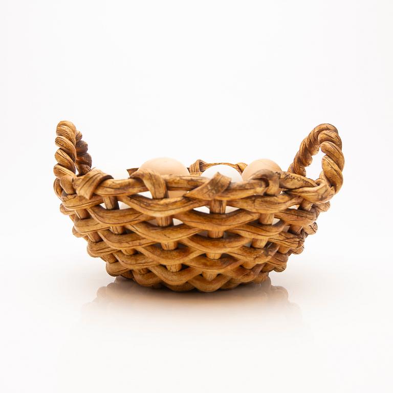 Ingrid Herrlin, basket with eggs, stoneware.