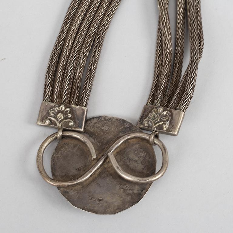 A Tibethan pendant/necklace, circa 1900.