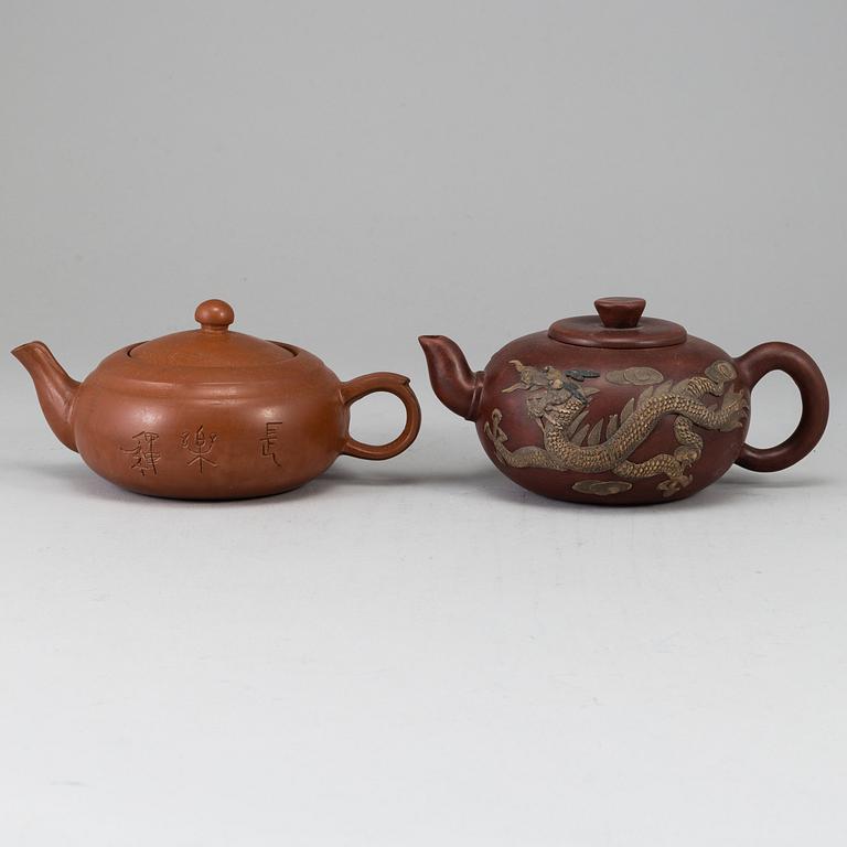 A group of two yixing teapots, 20th century.