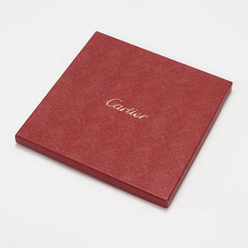 Cartier, a jaquard silk scarf.