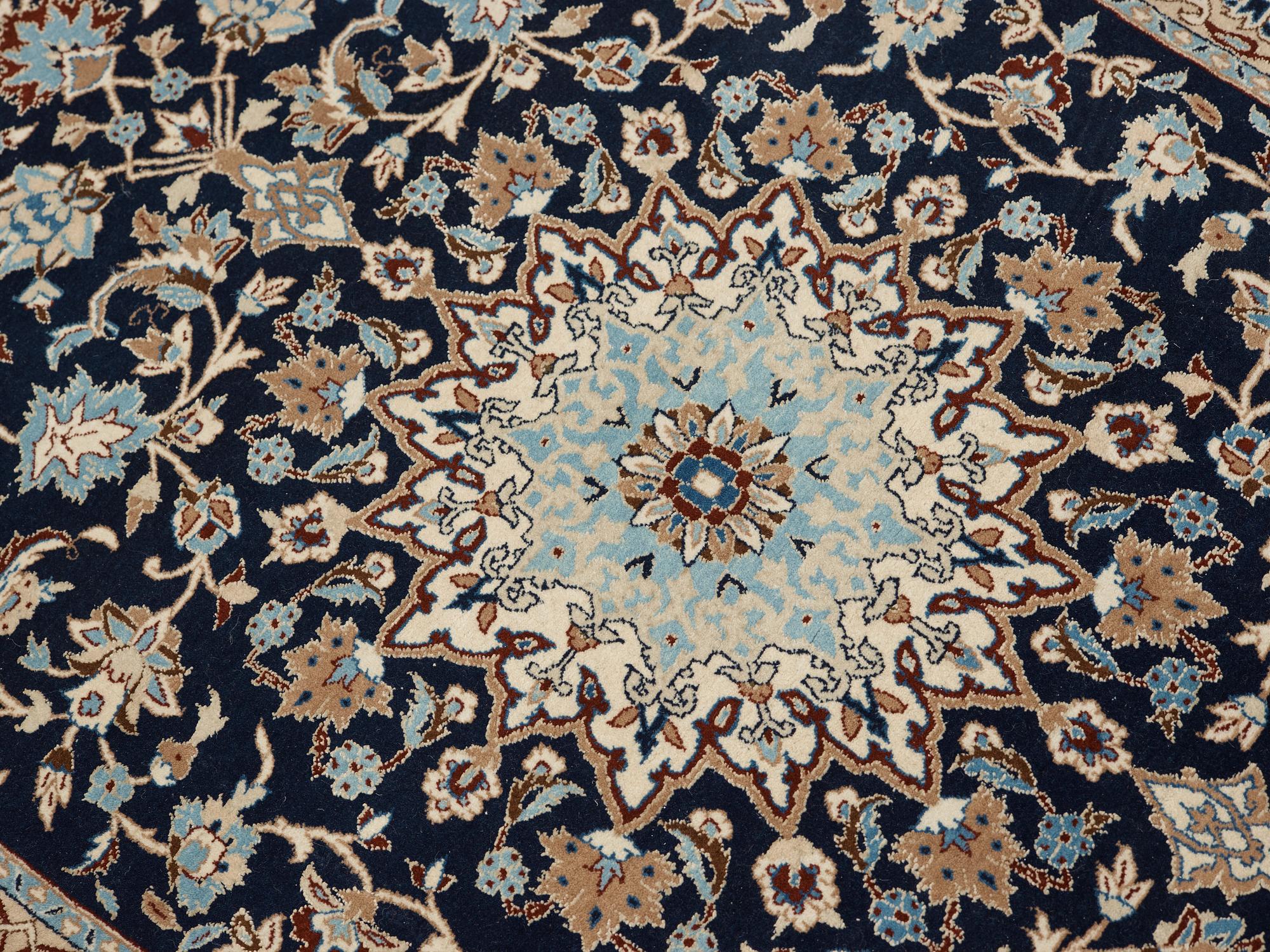 A 6 LAA Nain rug, around  119 x 77 cm.