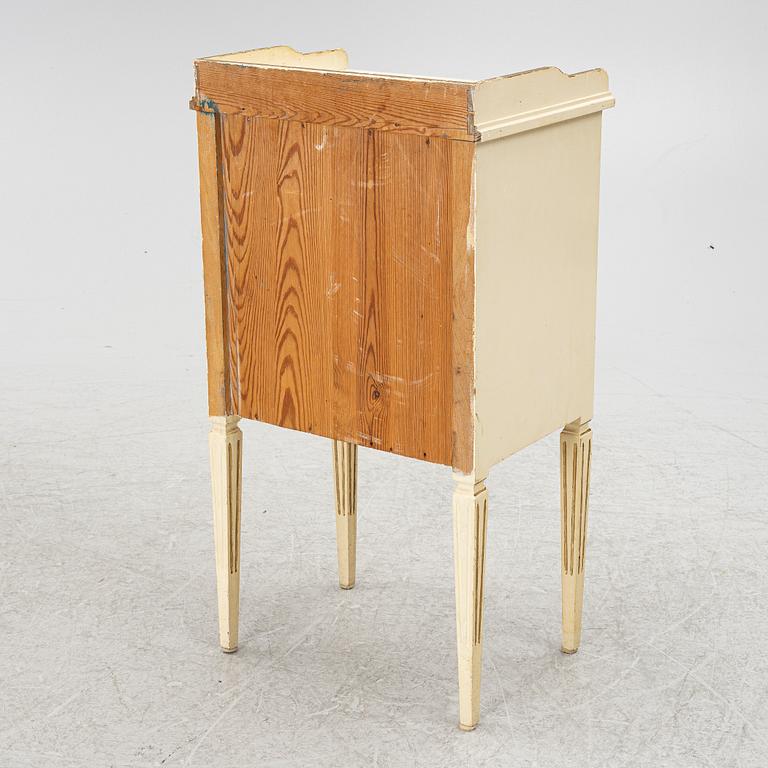 A Gustavian style bedside table, early 20th century.