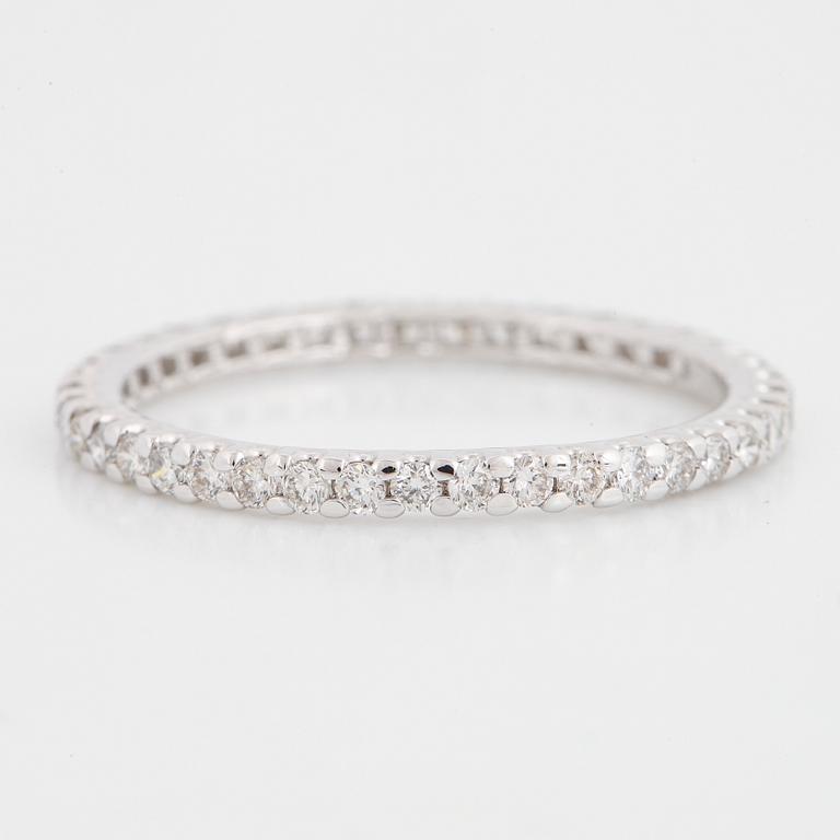 ALLIANSRING, tunn, 18K vitguld med runda briljantslipade diamanter.