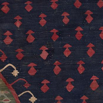 An antique Sarköy kelim, ca 239 x 214 cm.