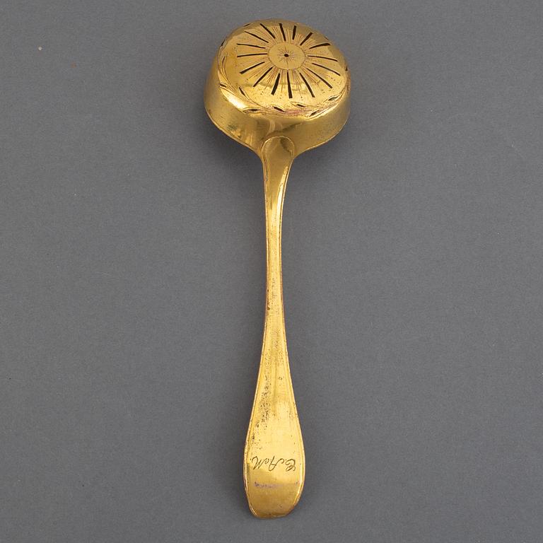 A Swedish 18th century gilt-metal caster-spoon.