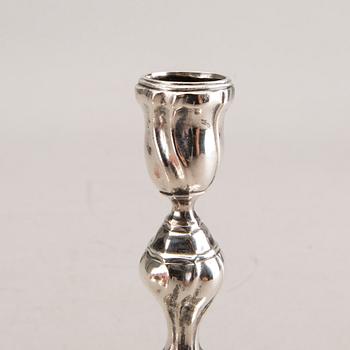 A pair of German silver candle sticks around 1900 total weight 374 gr.