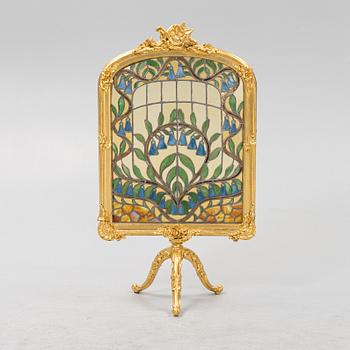 Brasskydd, Louis XV-stil, 1900-tal.