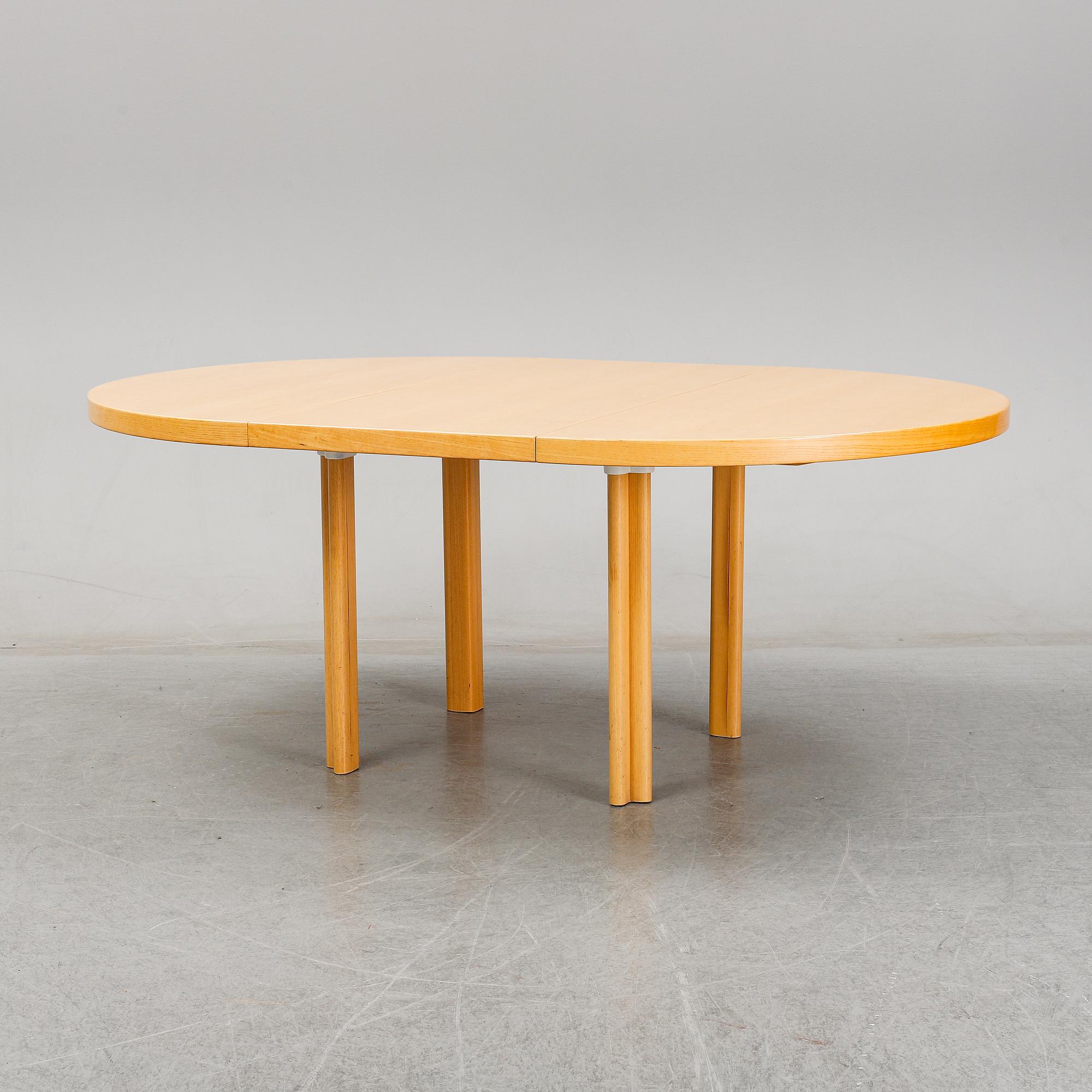 Alvar Aalto, an elm Artek dining table, Finland.