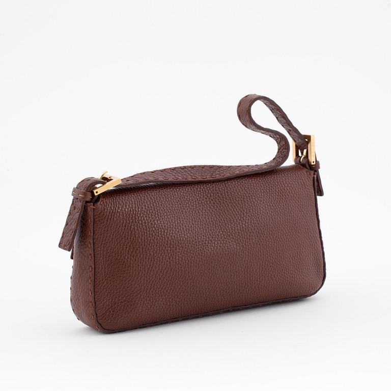 FENDI, a brown leather shoulder bag, "Baguette".